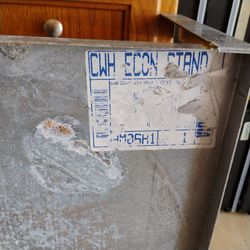 Hot water heater stand.  Used