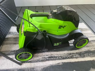 Green Works electric mower 13 inch brand new missing some parts no battery