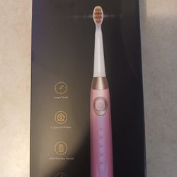 Brand New Pink Sonic Electric Toothbrush 