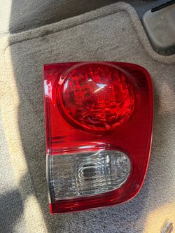 Driver side left inner tail gate light