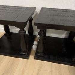 Two black end tables