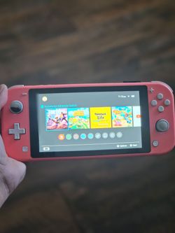 Switch lite in pink or salmon color