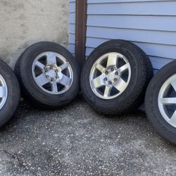 GMC Wheels.   W/ Goodyear Wrangler Tires. 18”.    