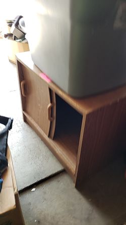 Wood thing with sliding doors