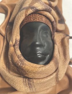 Folk-art Handcrafted Two-Tone Leather Black Face Wall Art 13.5” Tall 6” Wide.