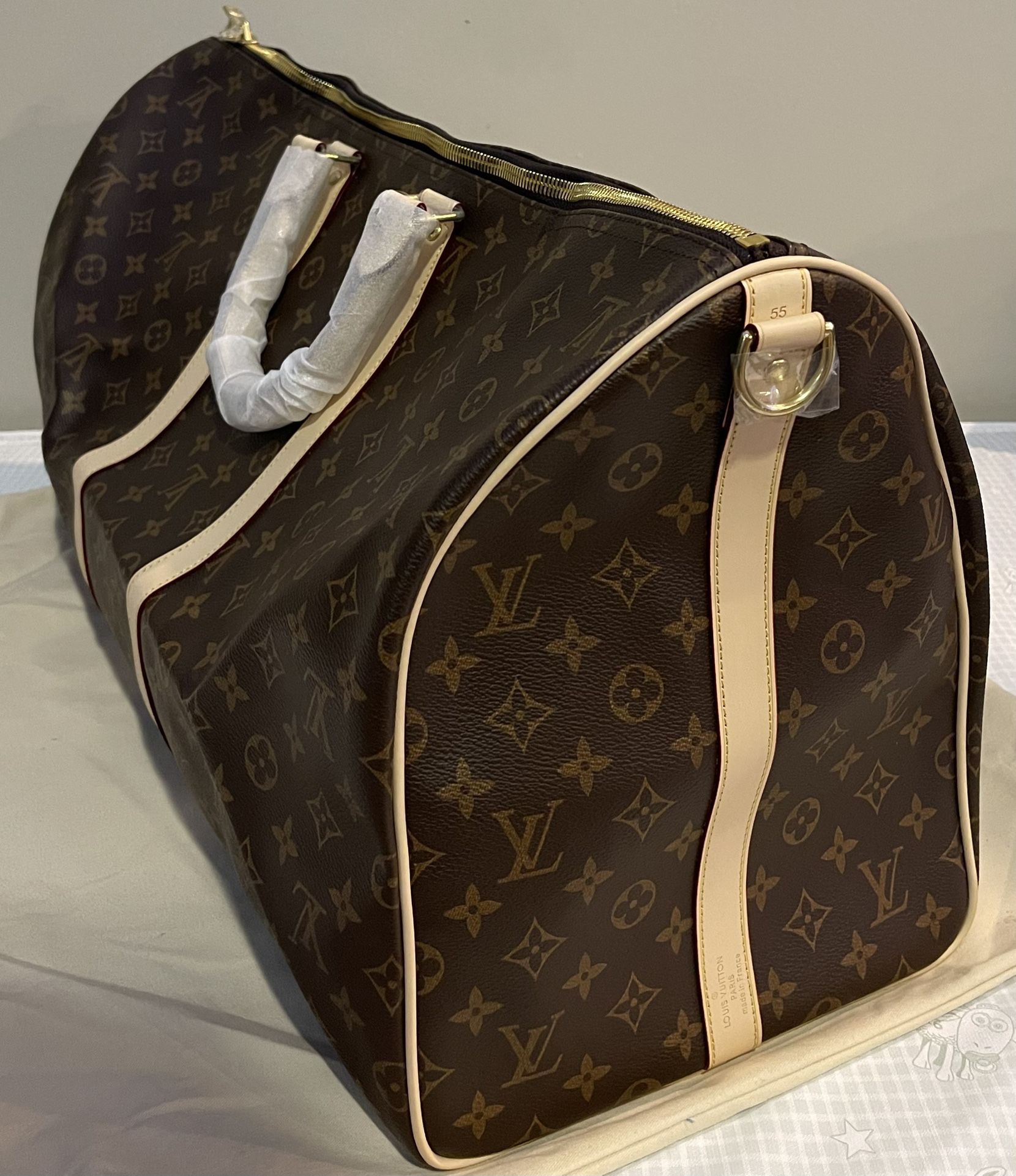 Louie Vuitton BANDOULIÈRE Duffle Bag for Sale in Atlanta, GA
