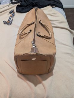 Genuine Louis Vuitton duffel bag.