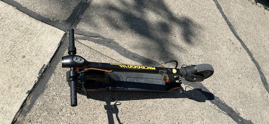 Electric scooter black with orange parts