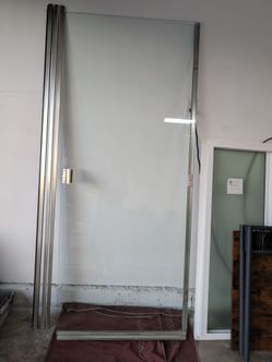Semi-Frameless Pivot Glass Shower Door with Tracks and Hardware".