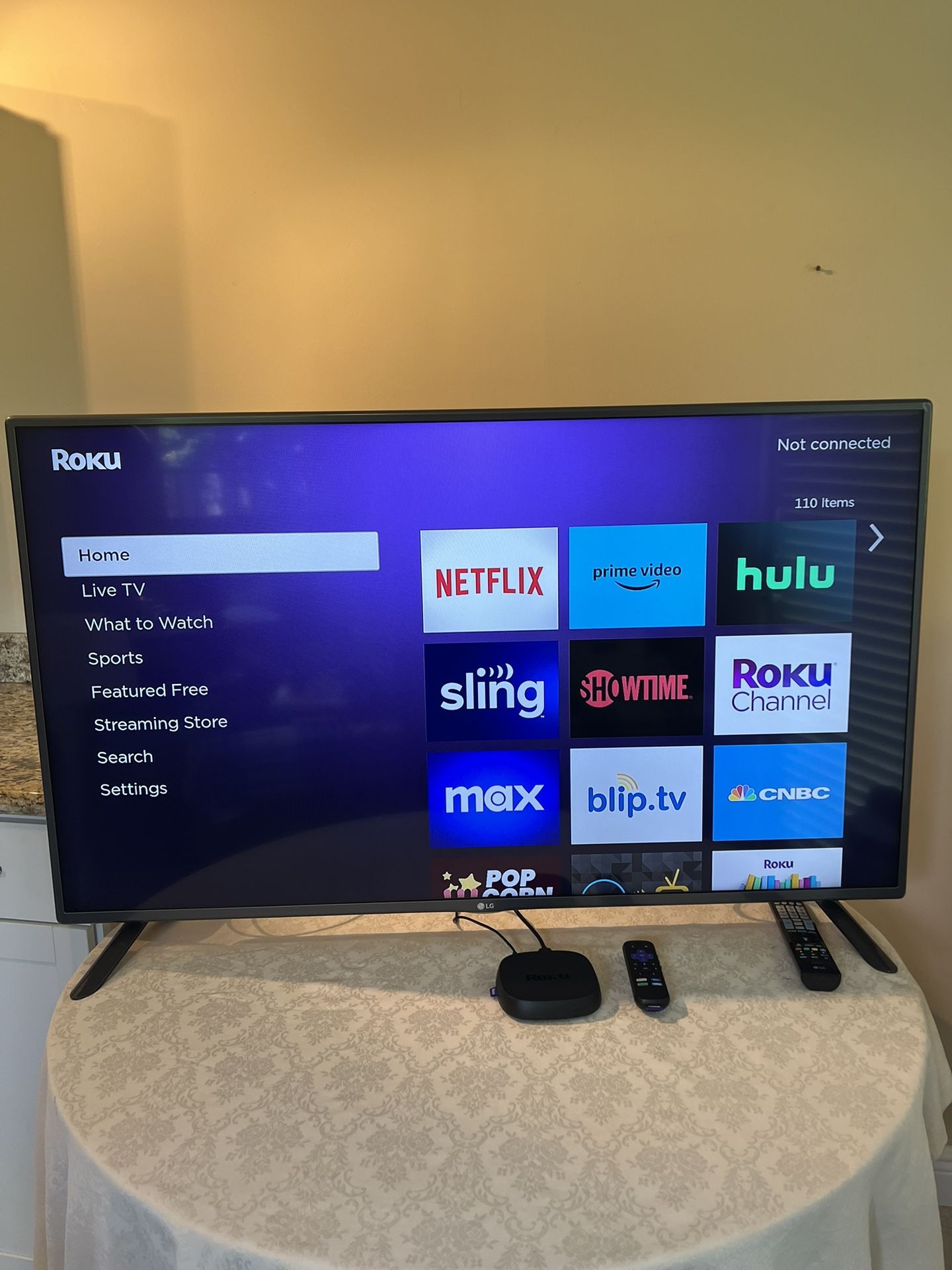 LG 50” TV WITH CONTROL + ROKU STREAMING DEVICE 