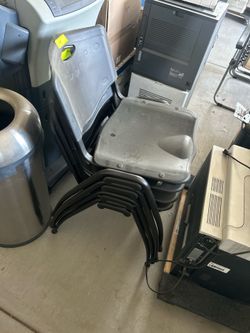 4 Black Stackable Plastic Chairs