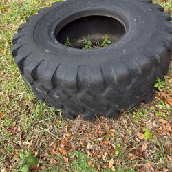 $50 Large tire about 200 pounds