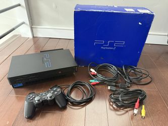 Sony PlayStation 2 with games and accessories