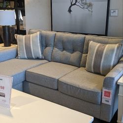 Grey Couch W/ Reversible Chaise And Covers