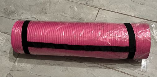 Yoga mat with carry strap