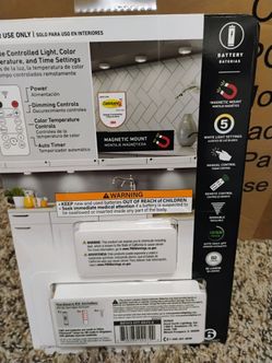 Good earth lighting battery puck light with remote
