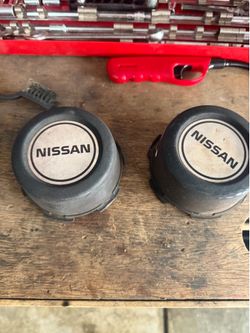 Nissan D21 hardbody hubcaps