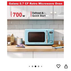 Galanz Retro Countertop Microwave Oven, model GLCMKZ07BER07, in the Bebop Blue color. 