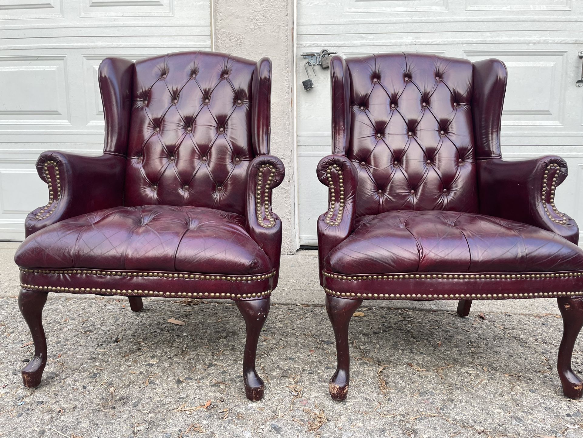 Tufted pair of wingback chairs