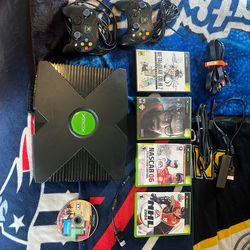Original Xbox bundle with two controllers and five games.
