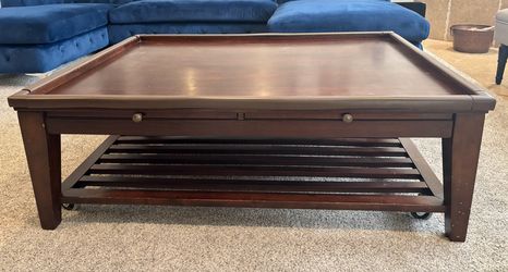 Wood Coffee Table with Pull-Out Trays, Shelf and Wheels: FREE