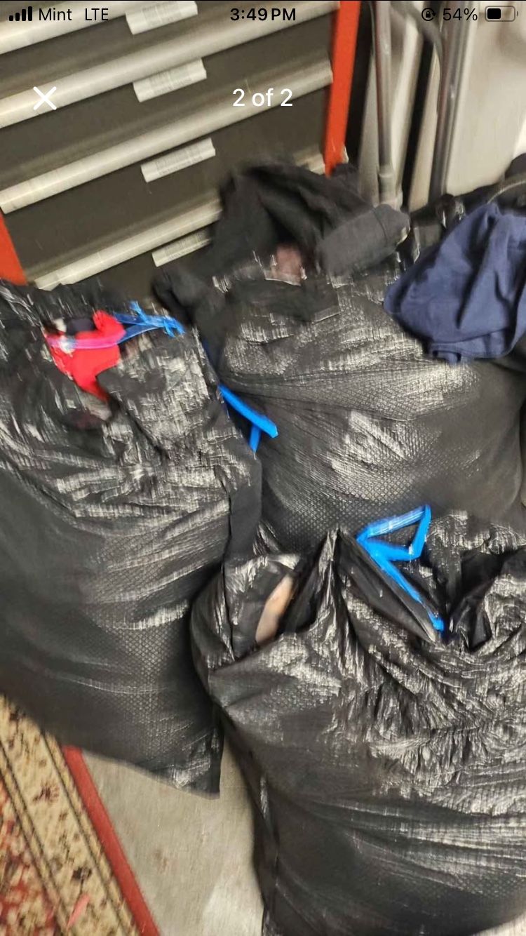 Black Bags Full Of Clothing 