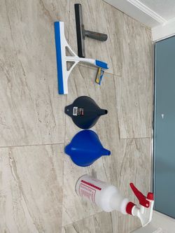 Oil filing tube , wipers , spray bottle ,  window cleaner all for