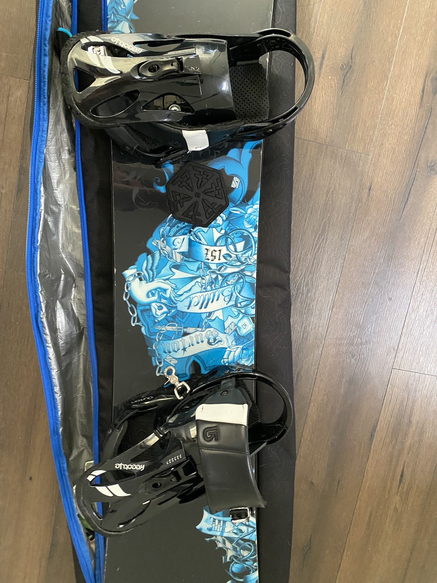 Burton Snowboard, Dakine Board Bag, And Burton Boots
