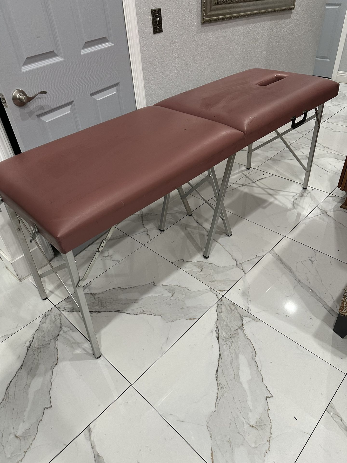 Foldable massage table