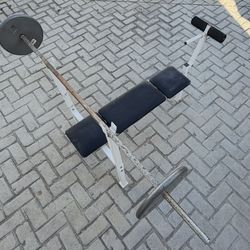 Bench press with weights & leg raise