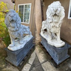 Exquisite Pair of Hand-Carved White Marble Lion Sculptures on Pedestals