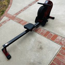 Rowing Machine, Battle Ropes, And 2 Iron Gyms