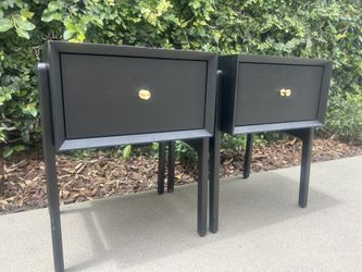 A Pair of Black Nightstands