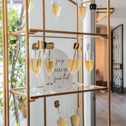 Collapsible Gold Shelf With Glass. Used Once For Wedding As Champagne Wall
