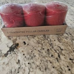 Three Brand New Red Candles