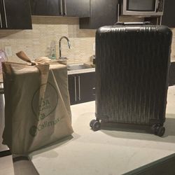 DIOR X RIMOWA ROLLING LUGGAGE 
