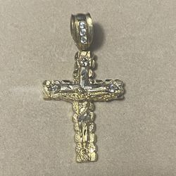 10-carat gold cross with very pretty little stones, I'm asking for 250 firm price.