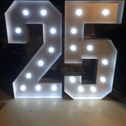 4 Foot Tall Silver And White Marquee Numbers 2 & 5. 
