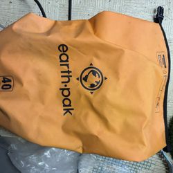 LOW PRICE MOVING- LARGE $240 + TAX RETAIL EARTH PACK WATERPROOF UNISEX BACKPACK