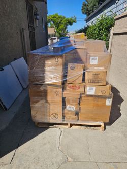Pallet with 30- 35 boxes of new merchandise