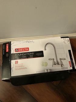 2 sink faucets