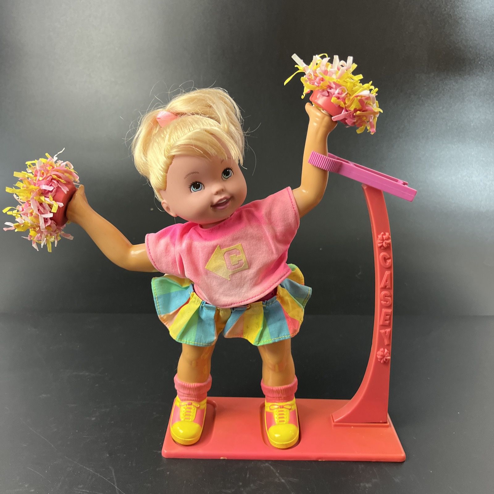 Vintage 1997 Toy Biz Casey Cartwheel Cheerleader Doll 11" Blonde Blue Eyes Stand  Clothing is faded, Not sure if i know how to work her, she does have