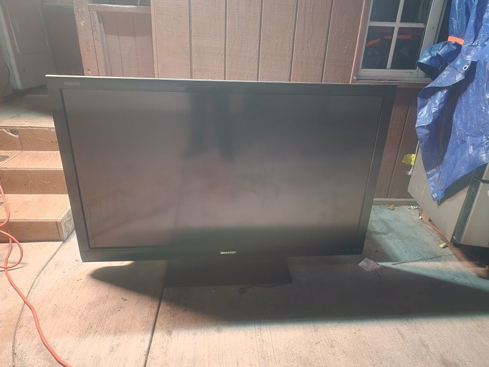Sharp 60 Inch TV with Stand