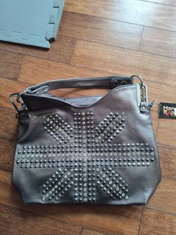 Studded purse with tags