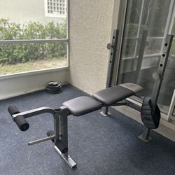 Gold's Gym XR 6.1 Multi-Position Weight Bench, Leg Developer and Cast Iron Weight Set included