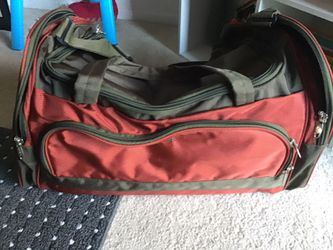 Duffel bag with front/ side pockets