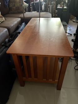 Wood Cocktail Table In a Good Condition