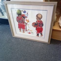 collectible artwork is a limited edition print titled "Bulls in the Paint" by artist Kenneth Gatewood, depicting babies dressed as Michael Jordan and 