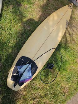 2 Dakine surfboards with bag