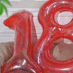 NEW IN BOX.  RED INFLATABLE NUMBERS ( 1 - 8)  EACH 48". HAS GLITTER INSIDE THEM.  USE FOR POOL; OR ANYWHERE YOU WANT TO. SEE PHOTOS.  CASH PICKUP ONLY